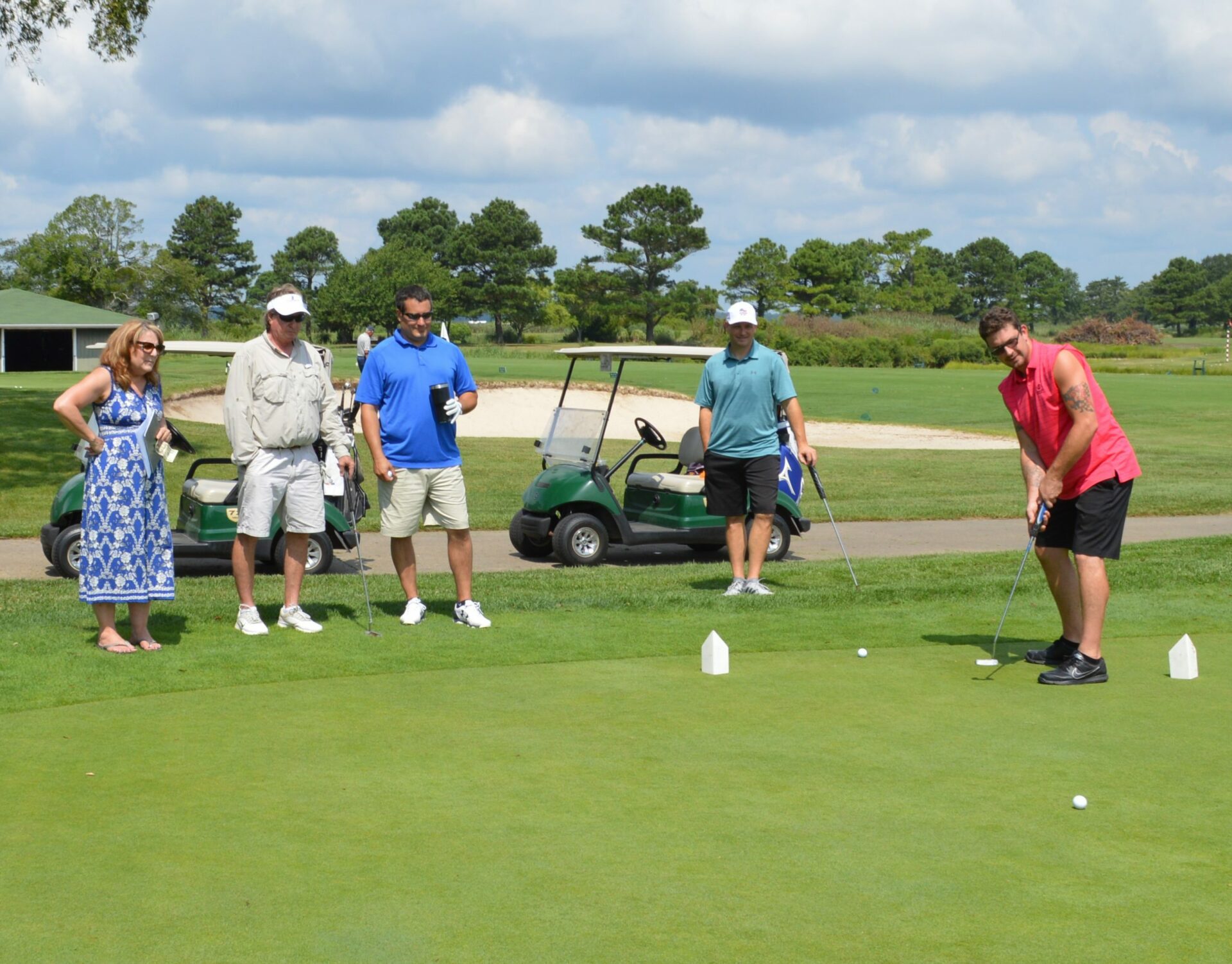 Group of 5 Contractors for a Cause members golfing